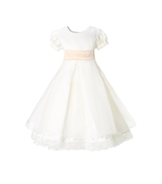 Little flower girl in British-style heirloom tiered tulle ceremony dress